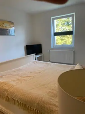 Ein Bett oder Betten in einem Zimmer der Unterkunft Ferienhaus Damian