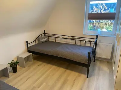 Ein Bett oder Betten in einem Zimmer der Unterkunft Ferienhaus Damian