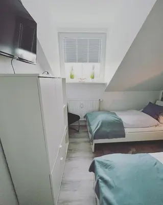 Ein Bett oder Betten in einem Zimmer der Unterkunft Ferienwohnung Watt un Leev in direkter Strand & Citynähe von Büsum