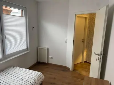 Ein Bett oder Betten in einem Zimmer der Unterkunft Koog Rooms