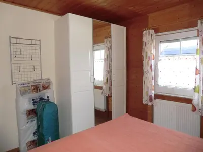 Ein Bett oder Betten in einem Zimmer der Unterkunft Ferienwohnung im Ferienhaus Kästner