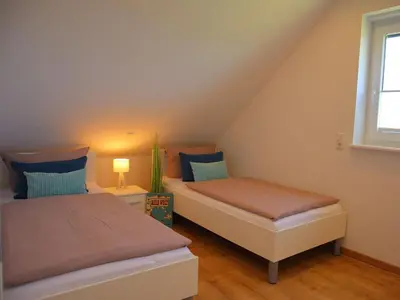 Ein Bett oder Betten in einem Zimmer der Unterkunft Ferienhaus Lee