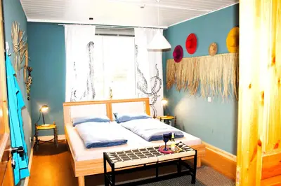 Ein Bett oder Betten in einem Zimmer der Unterkunft Steffis-Strand-Schule