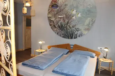 Ein Bett oder Betten in einem Zimmer der Unterkunft Steffis-Strand-Schule