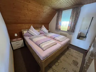 Ein Bett oder Betten in einem Zimmer der Unterkunft Haus am Deich