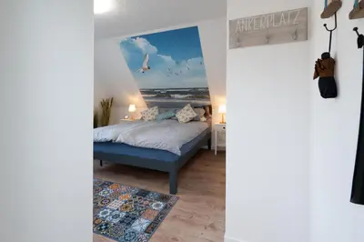 Ein Bett oder Betten in einem Zimmer der Unterkunft Tinka