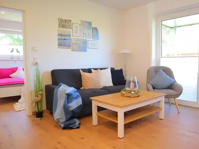 Ein Sitzbereich in der Unterkunft Ferienwohnung Wat Mutt