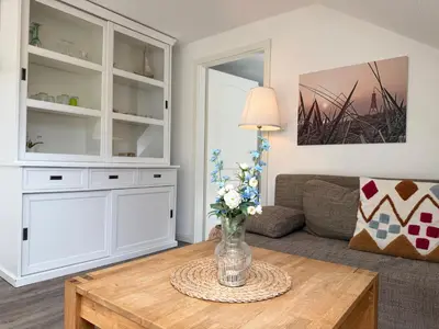 Ein Sitzbereich in der Unterkunft Kapitänshaus FeWo 3