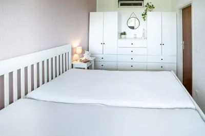 Ein Bett oder Betten in einem Zimmer der Unterkunft Vogelsand - 328
