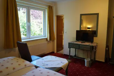 Ein Bett oder Betten in einem Zimmer der Unterkunft Hotel Neuses