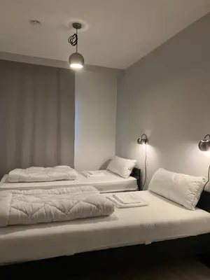 Ein Bett oder Betten in einem Zimmer der Unterkunft Nordseepanorama 212