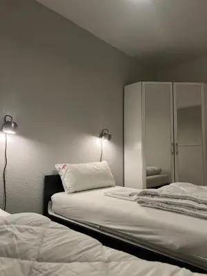 Ein Bett oder Betten in einem Zimmer der Unterkunft Nordseepanorama 212