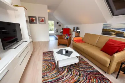 Ein Sitzbereich in der Unterkunft Haus 4Muscheln Appartement 4M2