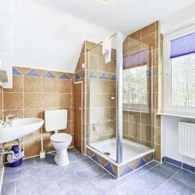 Ein Badezimmer in der Unterkunft Haus Küstenperle