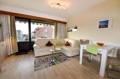 Ein Sitzbereich in der Unterkunft Haus Jan am Strand Wohnung - 215