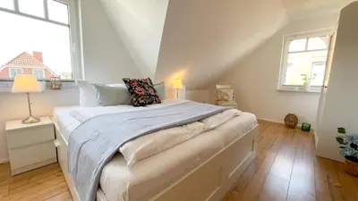 Ein Bett oder Betten in einem Zimmer der Unterkunft Haus Eversand Nr 2
