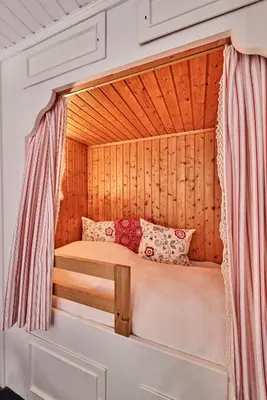 Ein Bett oder Betten in einem Zimmer der Unterkunft Dünengras