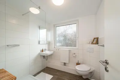 Ein Badezimmer in der Unterkunft Perlebüdchen