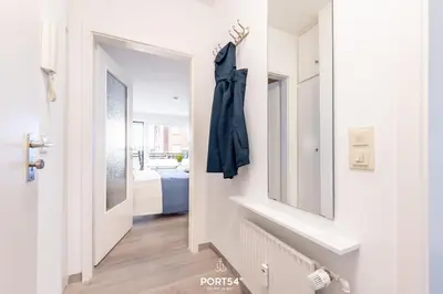 Ein Bett oder Betten in einem Zimmer der Unterkunft Ferienwohnung Hafenschlösschen