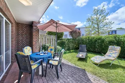 Ein Garten an der Unterkunft Haus Maike 13A