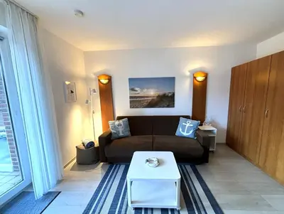Ein Sitzbereich in der Unterkunft Residenz Kormoran Wohnung 1.06