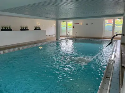 Der Swimmingpool an oder in der Nähe von Residenz Kormoran Wohnung 1.06