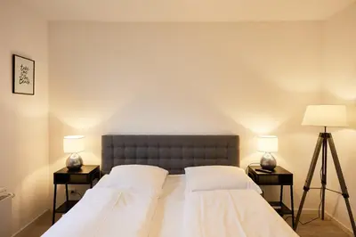 Ein Bett oder Betten in einem Zimmer der Unterkunft Heimathafen