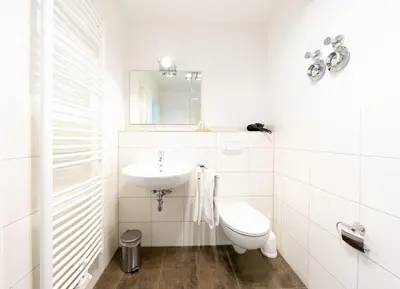 Ein Badezimmer in der Unterkunft Hohe Lith - 335