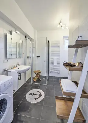 Ein Badezimmer in der Unterkunft Küstenheide