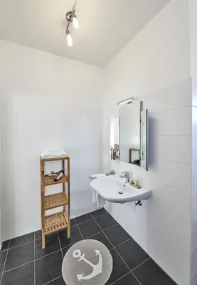 Ein Badezimmer in der Unterkunft Küstenheide