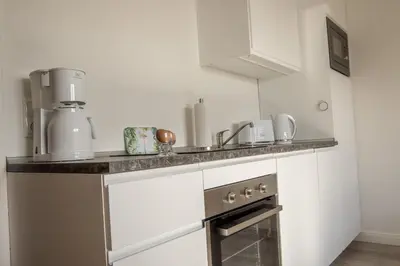 Küche/Küchenzeile in der Unterkunft Haus Ingeborg Wohnung 1 EG