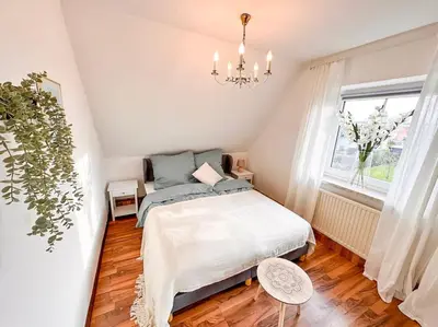 Ein Bett oder Betten in einem Zimmer der Unterkunft Watt'n Traum II - Wohnung nahe Nordseestrand