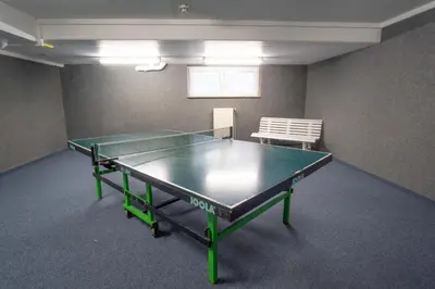 Tischtennis in der Unterkunft Moderne strandnahe Fewo inkl Pool, Sauna, Whirlpool & Strandkorb - 235 oder in der Nähe