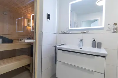 Ein Badezimmer in der Unterkunft Dorumer Sielhuss 11