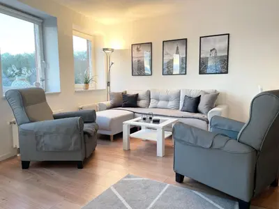 Ein Sitzbereich in der Unterkunft Haus Nordseebrandung FeWo C2.2