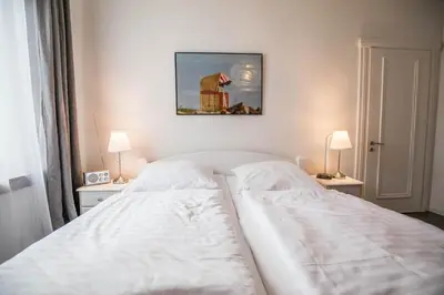Ein Bett oder Betten in einem Zimmer der Unterkunft Haus Wellen und Meer Apartment 2
