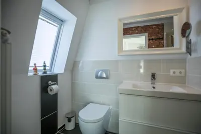 Ein Badezimmer in der Unterkunft Haus Wellen und Meer Apartment 3