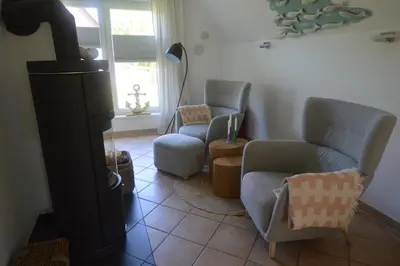 Ein Sitzbereich in der Unterkunft Ferienhaus Heimathafen