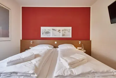 Ein Bett oder Betten in einem Zimmer der Unterkunft Residenz Seegras - 1