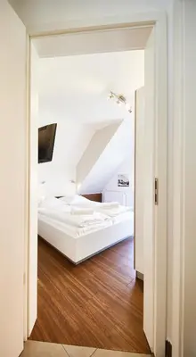 Ein Bett oder Betten in einem Zimmer der Unterkunft Residenz Seegras - 2