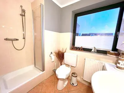 Ein Badezimmer in der Unterkunft Outer Banks - by Mila FerienARPartments - Büsum Zentrum eigener Parkplatz Balkon
