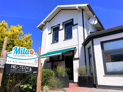 Ein Zertifikat, Auszeichnung, Logo oder anderes Dokument, das in der Unterkunft Villa Mila EG - by Mila FerienARPartments - Büsum Hafen, eigener Parkplatz, Terrasse ausgestellt ist