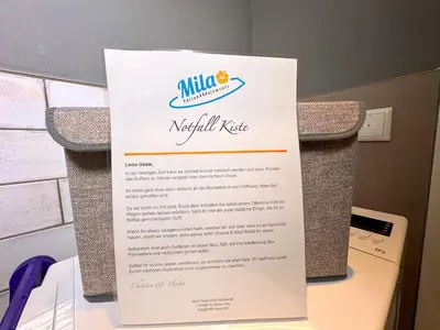 Ein Zertifikat, Auszeichnung, Logo oder anderes Dokument, das in der Unterkunft Villa Mila EG - by Mila FerienARPartments - Büsum Hafen, eigener Parkplatz, Terrasse ausgestellt ist
