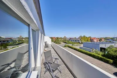 Ein Balkon oder eine Terrasse in der Unterkunft Rotesand - 128