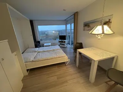 Ein Bett oder Betten in einem Zimmer der Unterkunft Frische Brise FeWo 04.05