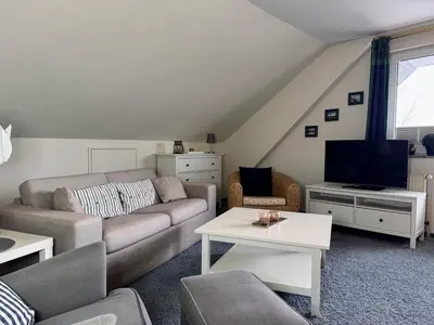 Ein Sitzbereich in der Unterkunft Seestern Steinmarnerstr 25-27, Whg 12