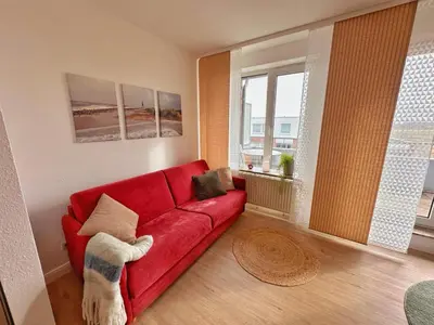 Ein Sitzbereich in der Unterkunft Watt & Wind - Pool, Sauna, Dampfbad, Tischtennis, schnelles WLAN