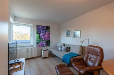 Ein Sitzbereich in der Unterkunft Terrassenhaus, Whg 48