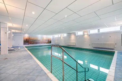 Der Swimmingpool an oder in der Nähe von Wellness Ferienwohnung Strandperle