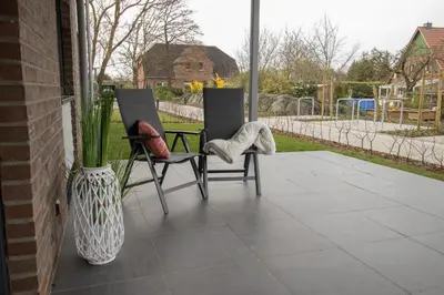 Ein Garten an der Unterkunft Nordseebrise Dorum - Dorumer Sielhuus 2